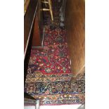 A Persian carpet, the central floral med