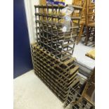 Four metal framed wine racks, and a bamb