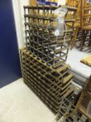 Four metal framed wine racks, and a bamb