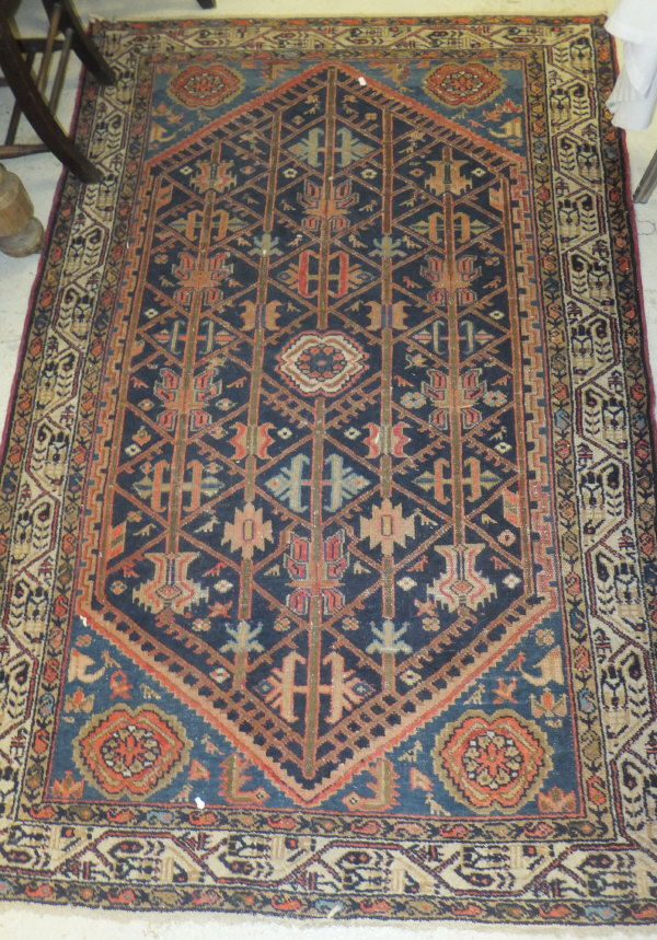 A Caucasian rug, the centre field with r