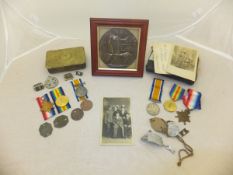 A 1914-15 Star, the British War medal and the Victory medal, all inscribed to "PTE A.J.EMMS. RIF;