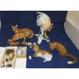 A collection of Rosenthal porcelain fox figures to include a figure group as a pair, two fox cubs