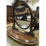 A Victorian mahogany oval dressing mirro