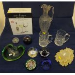 Assorted Dartington crystal wine glasses, glass commemorative mugs, various glass paperweights