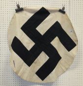 A World War II cloth Swastika roundel, black on a white background CONDITION REPORTS Approx 71cm