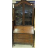 An Edwardian mahogany veneered bureau bo