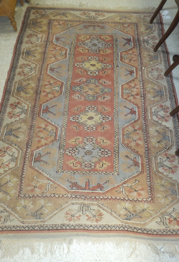 A Turkish rug, the five central diamond