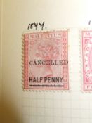 Two stamp albums containing Mauritius 10
