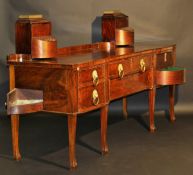 A Regency mahogany breakfront sideboard, the top with two revolving knife boxes surmounted by