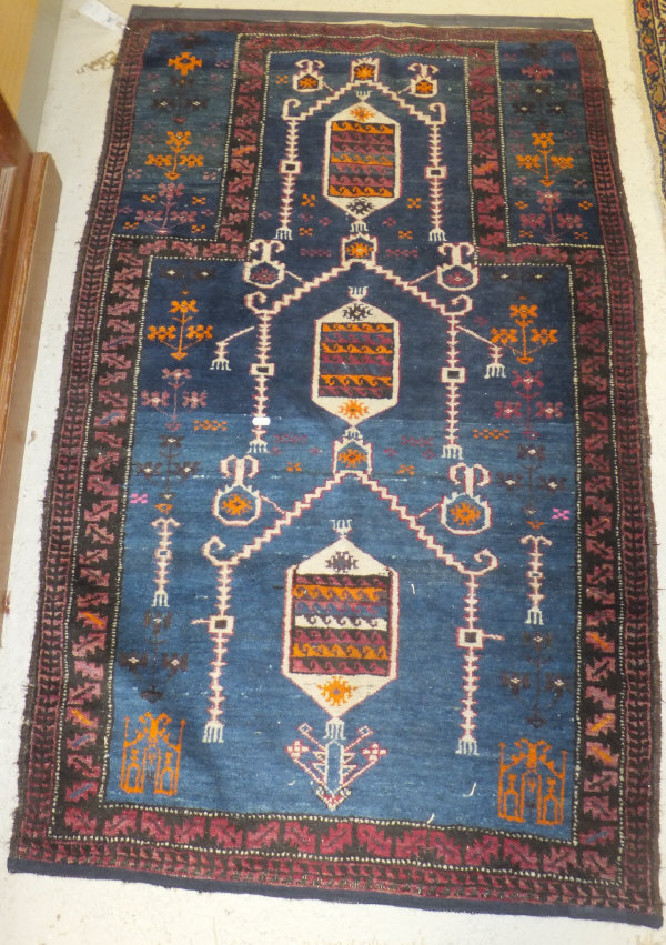 A Caucasian prayer rug, the three centra