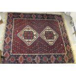 An Afshar rug, the two central diamond s