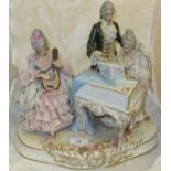 A large capo-di-monte type porcelain figure group depicting musicians in 18th Century dress,