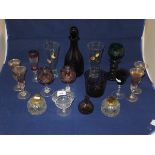 An amethyst coloured glass decanter insc