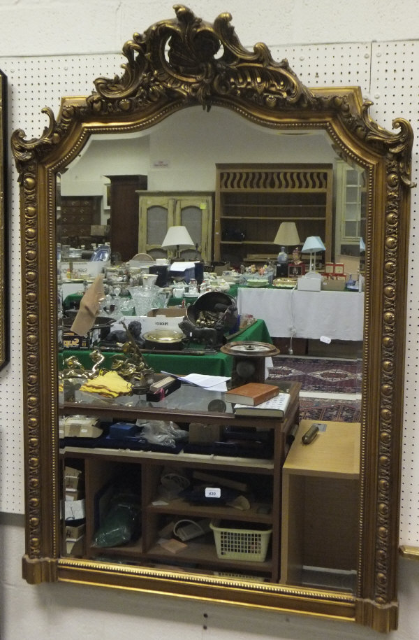 A modern gilt framed overmantel mirror i