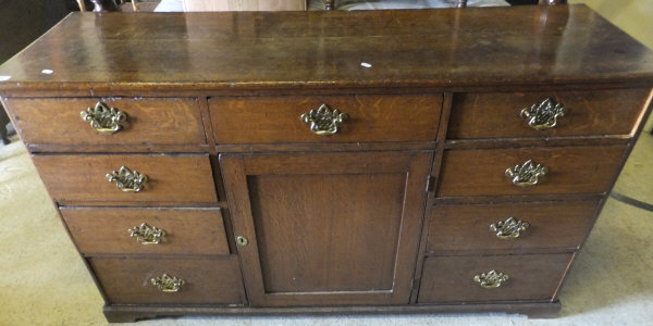 An oak enclosed dresser in the 18th Cent