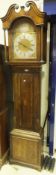 A 19th Century oak cased long case clock with later musical movement and brassed arched dial, with