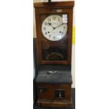 A National Time Recorder Co. Limited oak cased time recorder clock, bearing plaques inscribed "