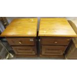 A pair of modern pine bedside chests