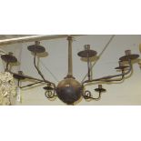 A wrought iron chandelier in the Flemish