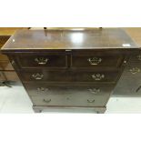 A George III style slim bachelor chest,