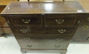 A George III style slim bachelor chest,