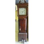 An early 19th Century oak long cased clock, the eight day movement with enamelled dial, Roman and