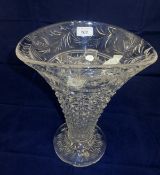 A cut crystal flower vase by Stuart