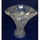 A cut crystal flower vase by Stuart