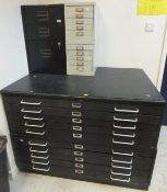 A modern black painted ten drawer plan c