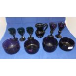 Eleven assorted Bristol green wine glasses, ten assorted amethyst coloured wine glasses, four