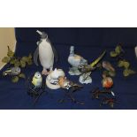 Three Coalport bird figures, raised on wirework branches, to include robin, blue tit and