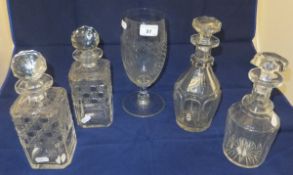 Four assorted cut glass decanters and a