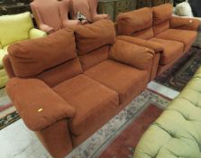 A modern orange suede effect upholstered