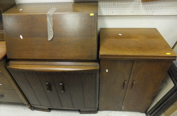 A mid 20th Century oak bureau and an oak