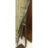 A telescope on wooden tripod stand CONDITION REPORTS Wear, scuffs, appears to be fairly  modern.