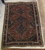 A Caucasian rug, the three linked diamon