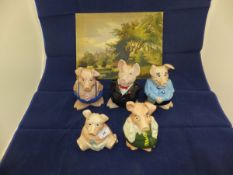 A set of five Wade Nat West piggy banks,