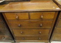 A late Victorian mahogany chest of two s