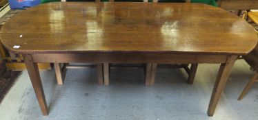 An oak and beech French style farmhouse kitchen table, the shaped top on square tapering legs