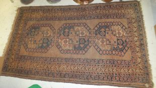 An Afghan rug, the three central medalli