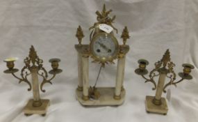 A late 19th Century French clock garnitu