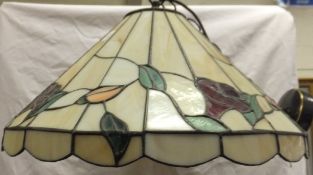 A coloured glass and leaded Tiffany styl