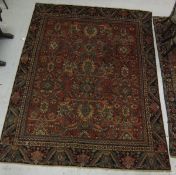 A Persian Mahal carpet, the centre field with floral and foliate motifs in cream, blue/green and