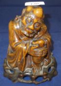 A 19th Century Chinese carved wooden figure of a kneeling gentleman with beard in robes CONDITION