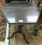 A mahogany wine table with carved base a