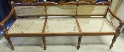 A modern Indian teak bergere settle in the Victorian manner CONDITION REPORTS Appox 60cm deep, 220cm