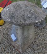A composite stone staddle stone