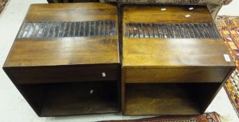 A pair of modern hardwood bedside tables