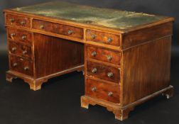 An early Victorian mahogany desk, the to