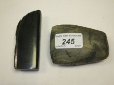 A Neolithic green stone axe head, together with a green stone polished section 
 CONDITION REPORTS
